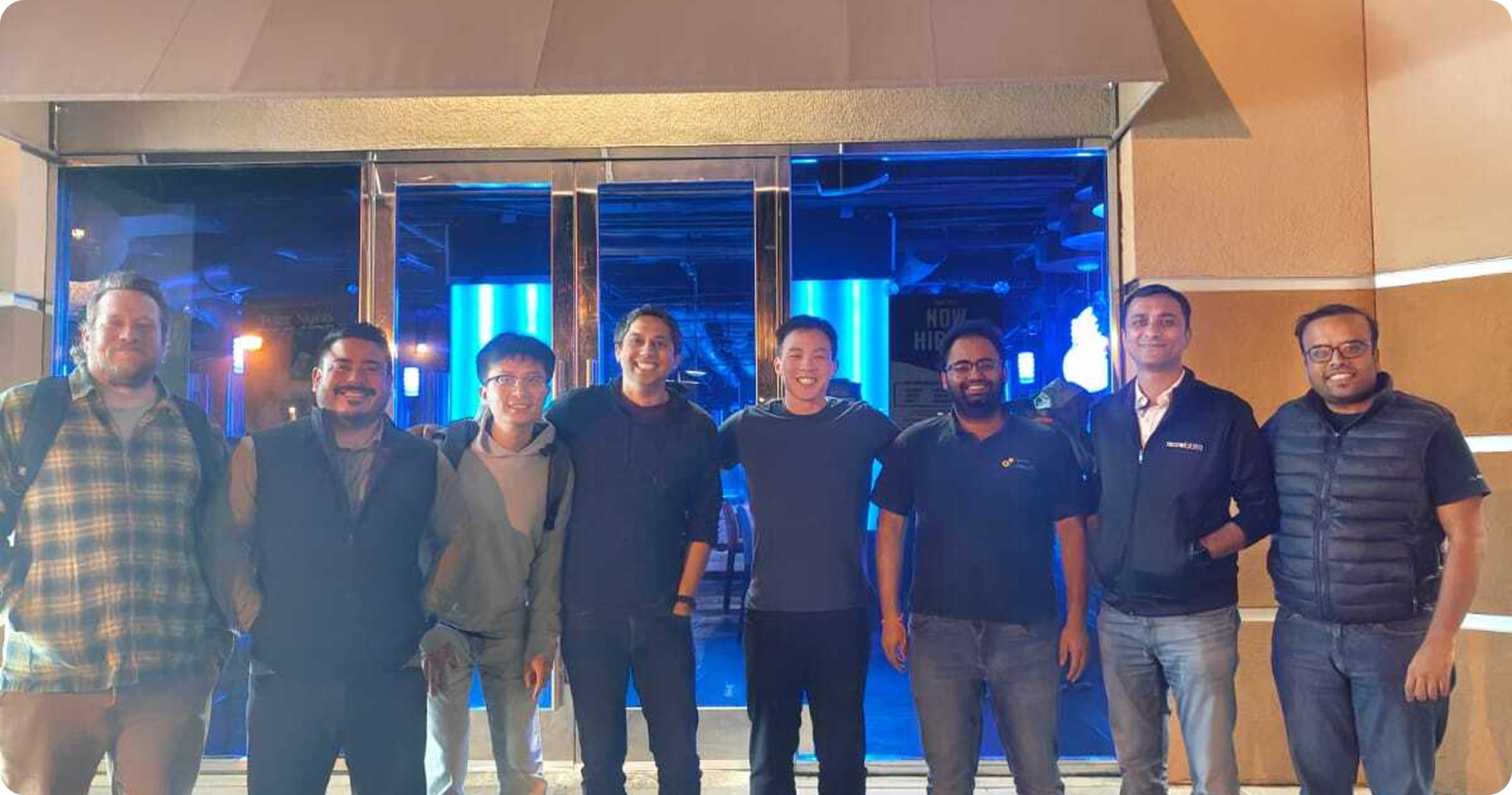 Team members gathered outside for dinner